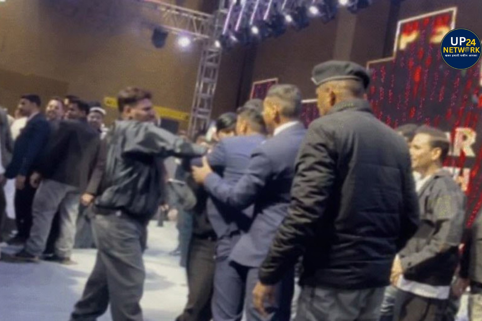 Crowd chaos at birthday celebration event.