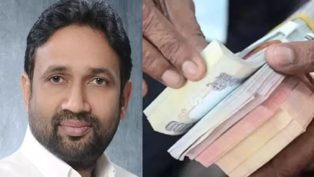 Person holding a stack of money.