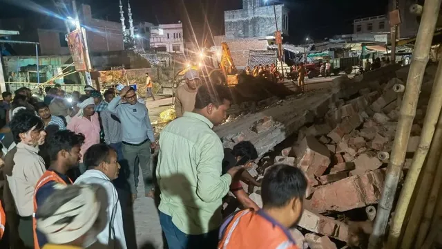 Bulandshahr House Collapse Chhatari, Uncle Nephew Death, NDRF Rescue Operation October 2026.Bulandshahr House Collapse Chhatari, Uncle Nephew Death, NDRF Rescue Operation October 2026.बुलंदशहर के छतारी में मकान गिरने का हादसा, आजाद रोड पर मकान ढहने से दो की मौत, मलबे में दबकर चाचा भतीजे की मौत, बुलंदशहर मकान हादसे में महिला घायल, जेसीबी से मलबा हटाकर चलाया गया रेस्क्यू अभियान, छतारी में पुलिस प्रशासन की राहत बचाव कार्रवाई,