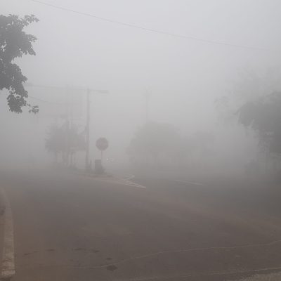 Dense fog obscuring the road visibility.